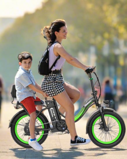 Mon riding the Hidoes C1 ebike with her son